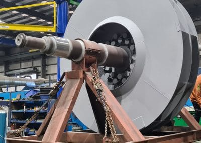 Laser clad stellite hardfacing on a large fan wear sleeve, assembled for dispatch